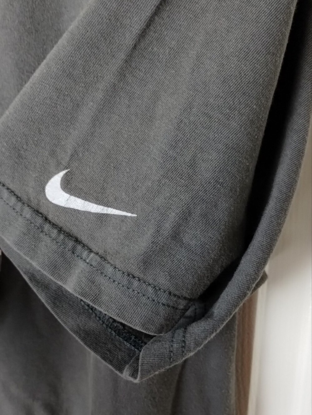 Nike Black Short-Sleeve Tee with Silver Swoosh Cutout.Large - Picture 5 of 8